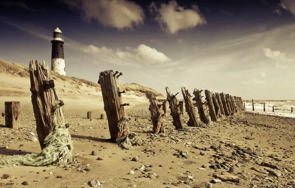Sea, shore, lighthouse