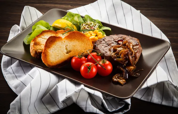 Greens, lemon, corn, bread, meat, tomatoes, tray