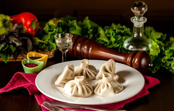 Greens, oil, pepper, spices, khinkali