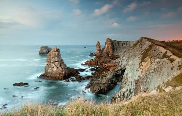 Sea, the sky, grass, clouds, rocks