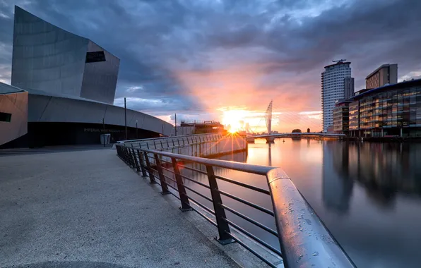 Sunset, the city, river