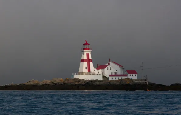 Picture sea, the sky, rocks, lighthouse