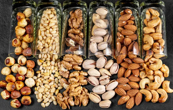 Glasses, nuts, almonds, hazelnuts, pistachios, cashews, walnut