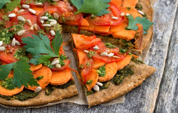 Picture pumpkin, pizza, seeds, tomatoes, parsley, vegetarian