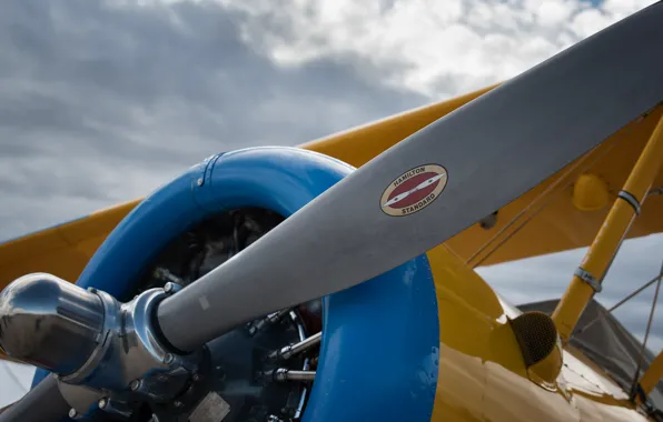 The plane, propeller, biplane