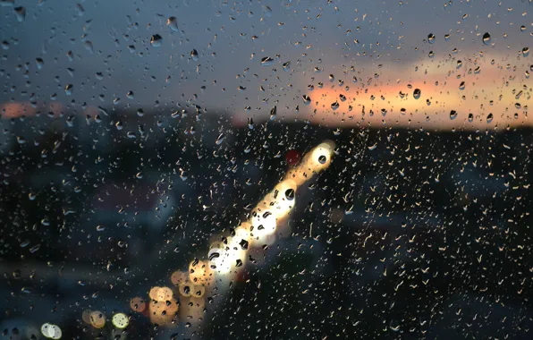 Picture glass, drops, squirt, the city, lights, rain, the evening