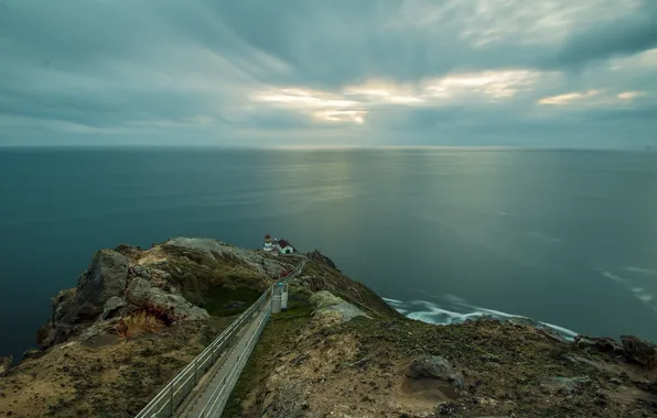 Sea, the sky, clouds, rocks, lighthouse, horizon