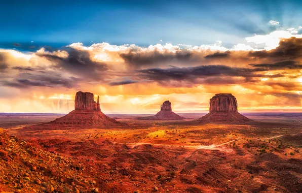 The sky, the sun, clouds, stones, rocks, dawn, desert, horizon