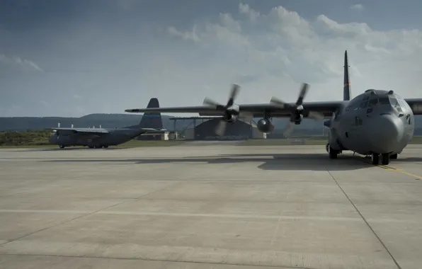 The plane, the airfield, hangars, C-130H Hercules, Canadian air force