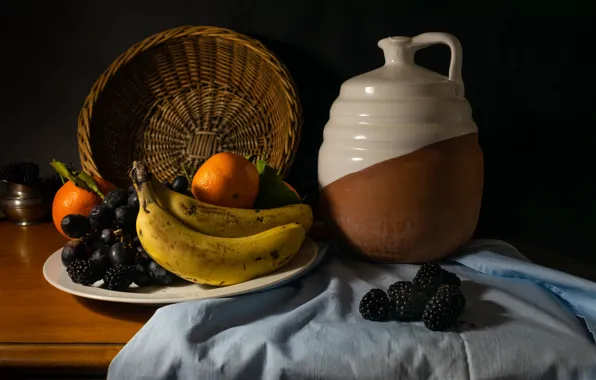Light, berries, the dark background, table, towel, plate, grapes, bananas
