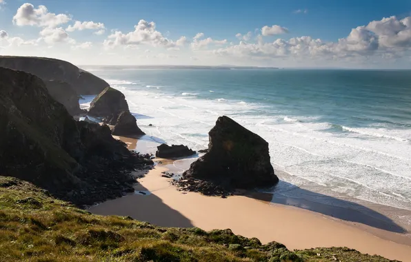 Sea, clouds, surf, rock. shore
