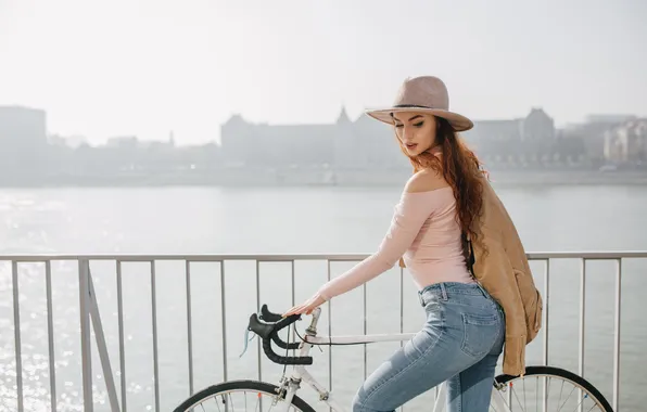 Bicycle, woman, shapely, red haired, riding