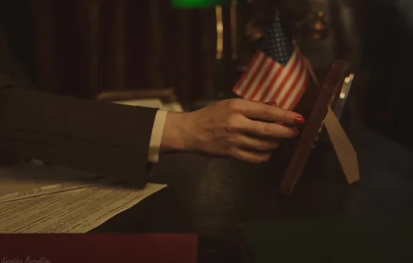 Hand, American flag, paper, Catherine Semadeni, Kristina Borodkina