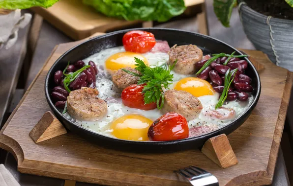 Scrambled eggs, tomatoes, parsley, sausage, pan, beans