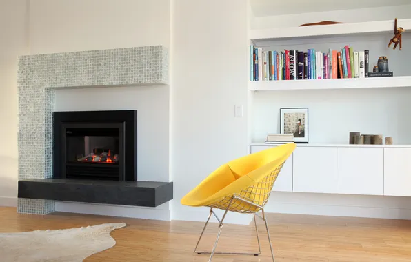 Picture books, chair, shelf, fireplace