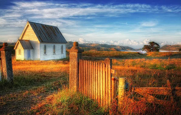 The sky, the fence, house