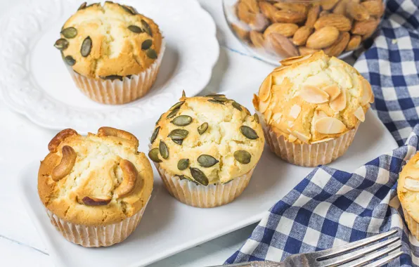 Plate, plug, nuts, cakes, almonds, pistachios, muffins, cashews