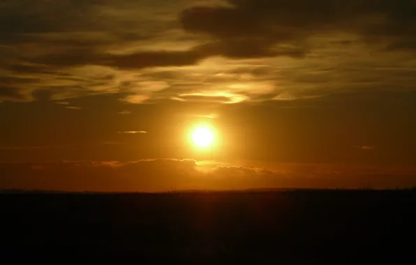 The sun, sunset, the steppe