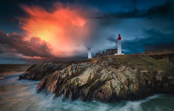 Sea, rocks, lighthouse