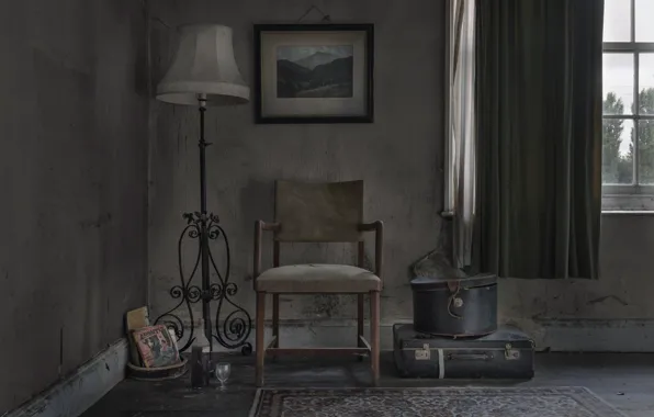 Window, chair, suitcase