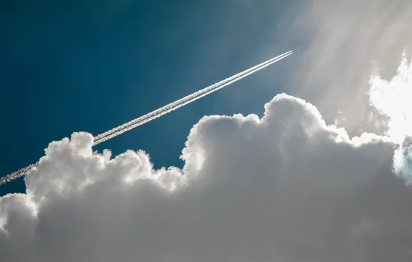 Trail, cloud, the plane