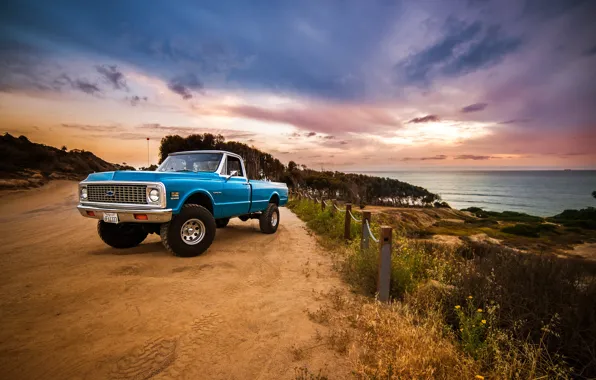 Road, sea, the sky, clouds, sunset, the fence, Chevrolet, wheel