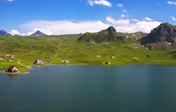 Picture the sky, clouds, green, lake, blue, rocks, hills, shore