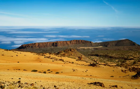 Sand, the sky, clouds, mountains, stones, desert