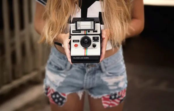 Shorts, camera, hands, Polaroid