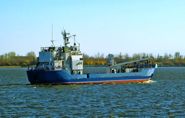 The sky, river, shore, ship