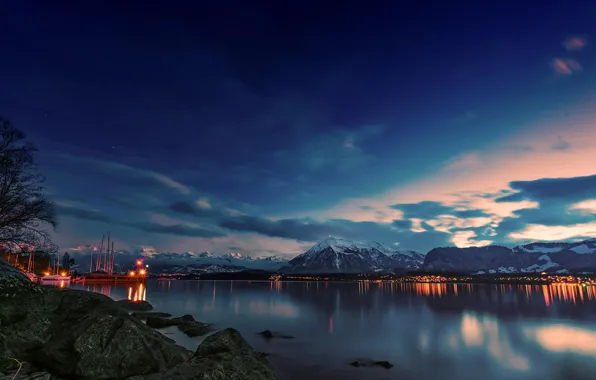 The sky, clouds, trees, sunset, mountains, lights, lake, stones