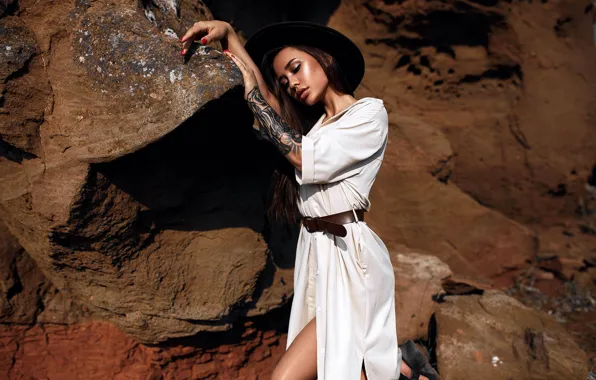 Picture the sun, nature, pose, stones, rocks, model, portrait, hat