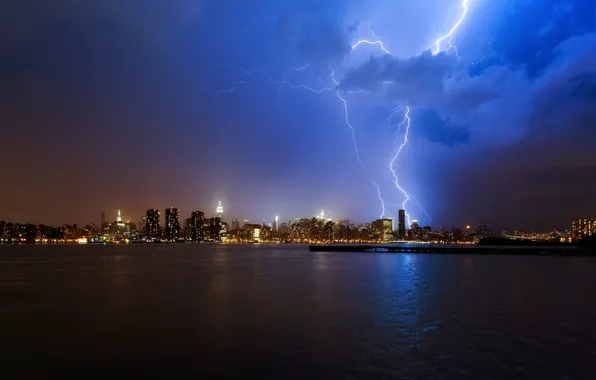 The storm, water, clouds, night, the city, lights, the ocean, lightning