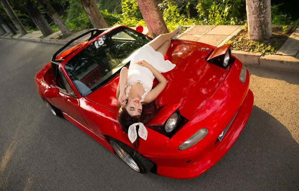 Girl, Asian, beautiful girl, red car, Mazda MX5, posing on the hood of the car