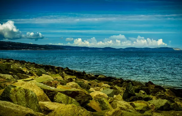 Sea, clouds, stones, coast, UK, Wales, Colwyn Bay