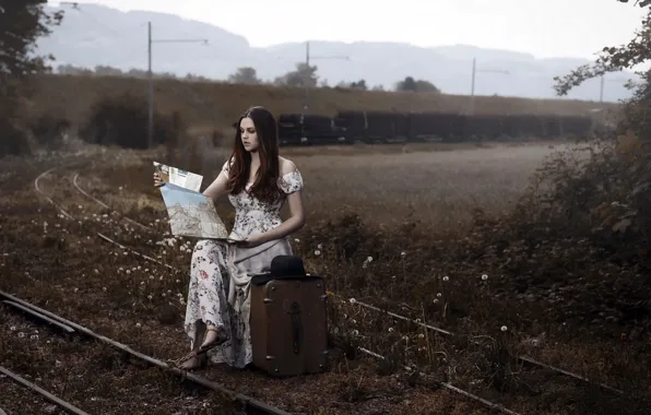 Picture girl, railroad, suitcase