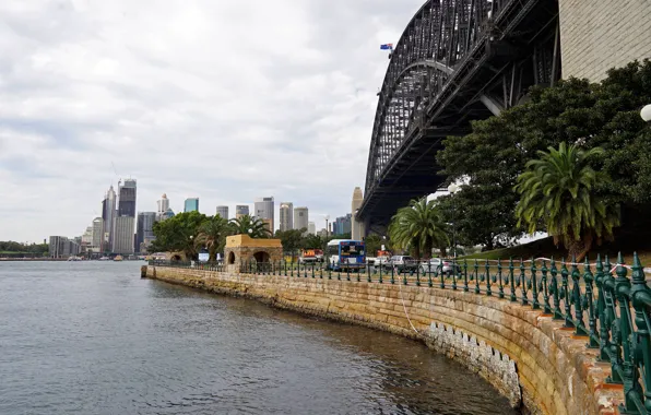 The sky, clouds, trees, bridge, river, palm trees, transport, building