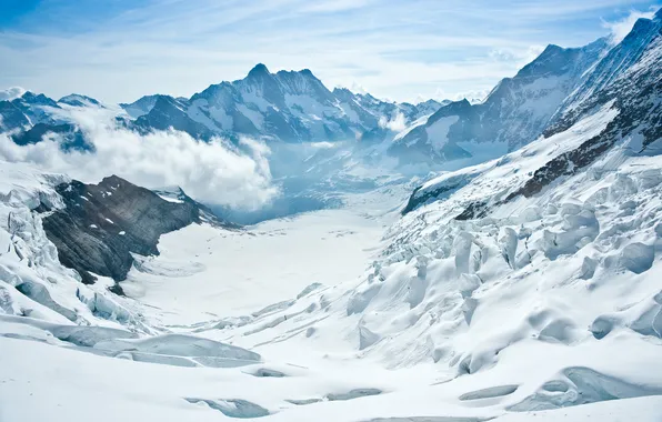 Winter, the sun, snow, mountains