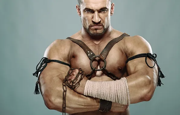 Picture eyes, muscles, gladiator, leather straps