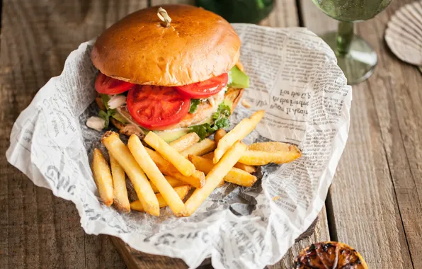 Tomatoes, hamburger, roll, French fries