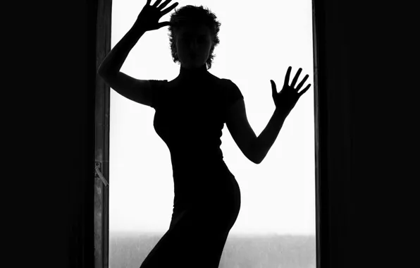 Woman, black and white, glass door