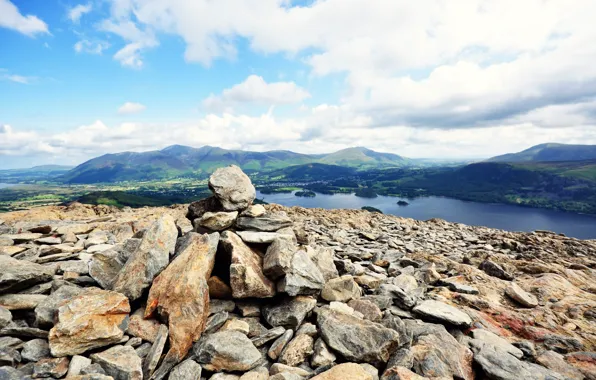 The sky, clouds, landscape, mountains, lake, stones