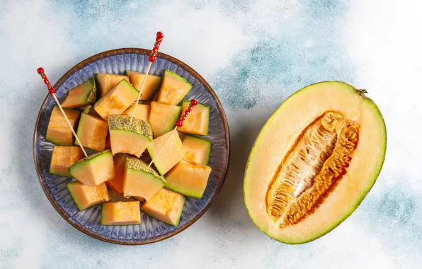 Light background, slices, slices, composition, melon, skewers