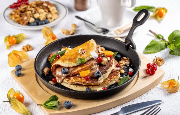 Berries, pancakes, pan