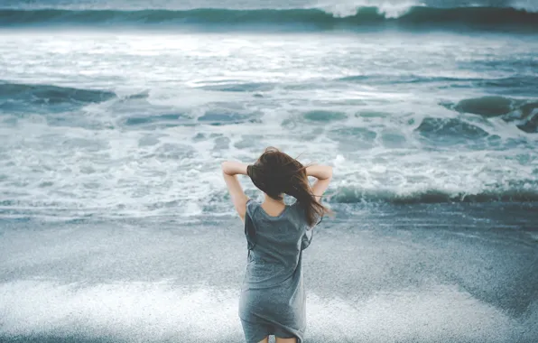 Girl, the wind, shore, surf