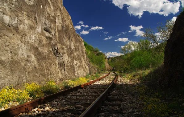 Clouds, mountains, railroad