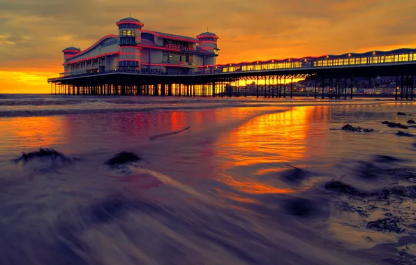 Sea, the sky, clouds, sunset, lights, the building, the evening, pierce