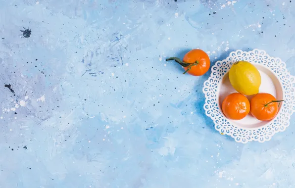 Lemon, plate, blue background, tangerines