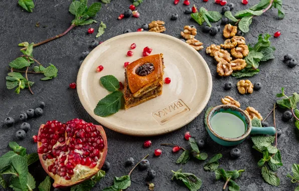 Tea, nuts, mint, garnet, blueberries, baklava
