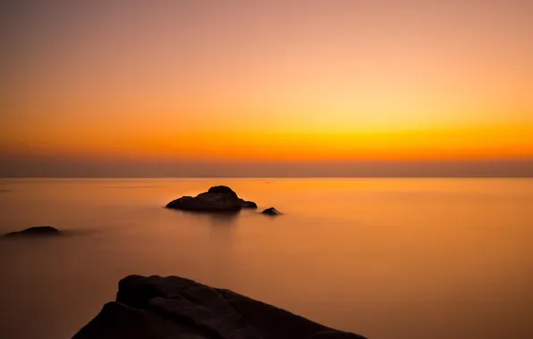 Picture landscape, the ocean, rocks, dawn, horizon